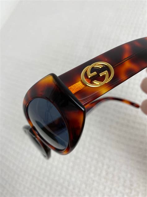 Gucci 90's Tortoise Shell Gold Logo Sunglasses.